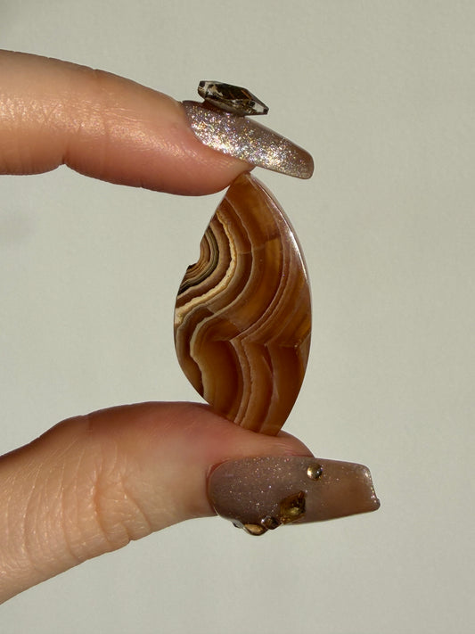 Brown Rhodochrosite Cabochon E