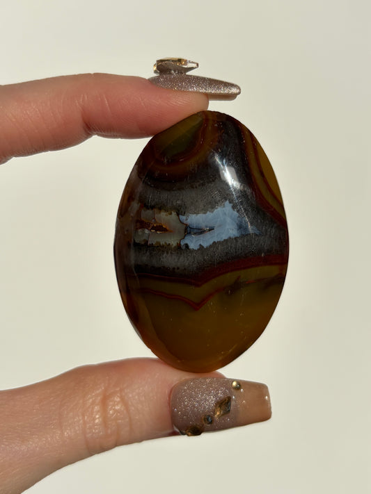 Ochre Yellow & Red Banded Indonesian Agate with Quartz and Dendritic Inclusions Palmstone B