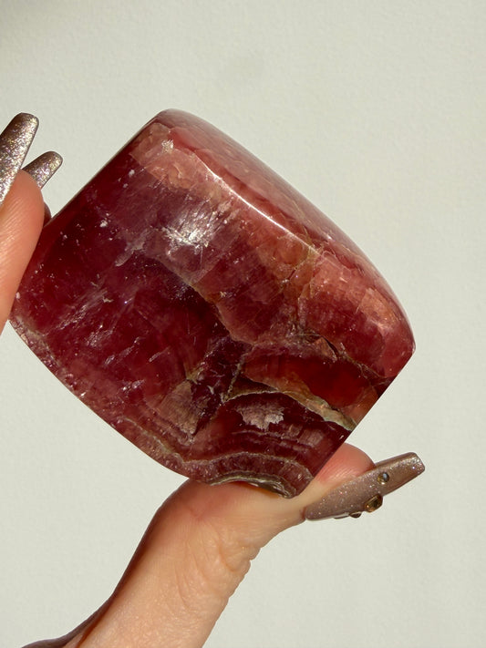 “Luminance” Gemmy Gel Rhodochrosite Freeform with Copper Inclusions