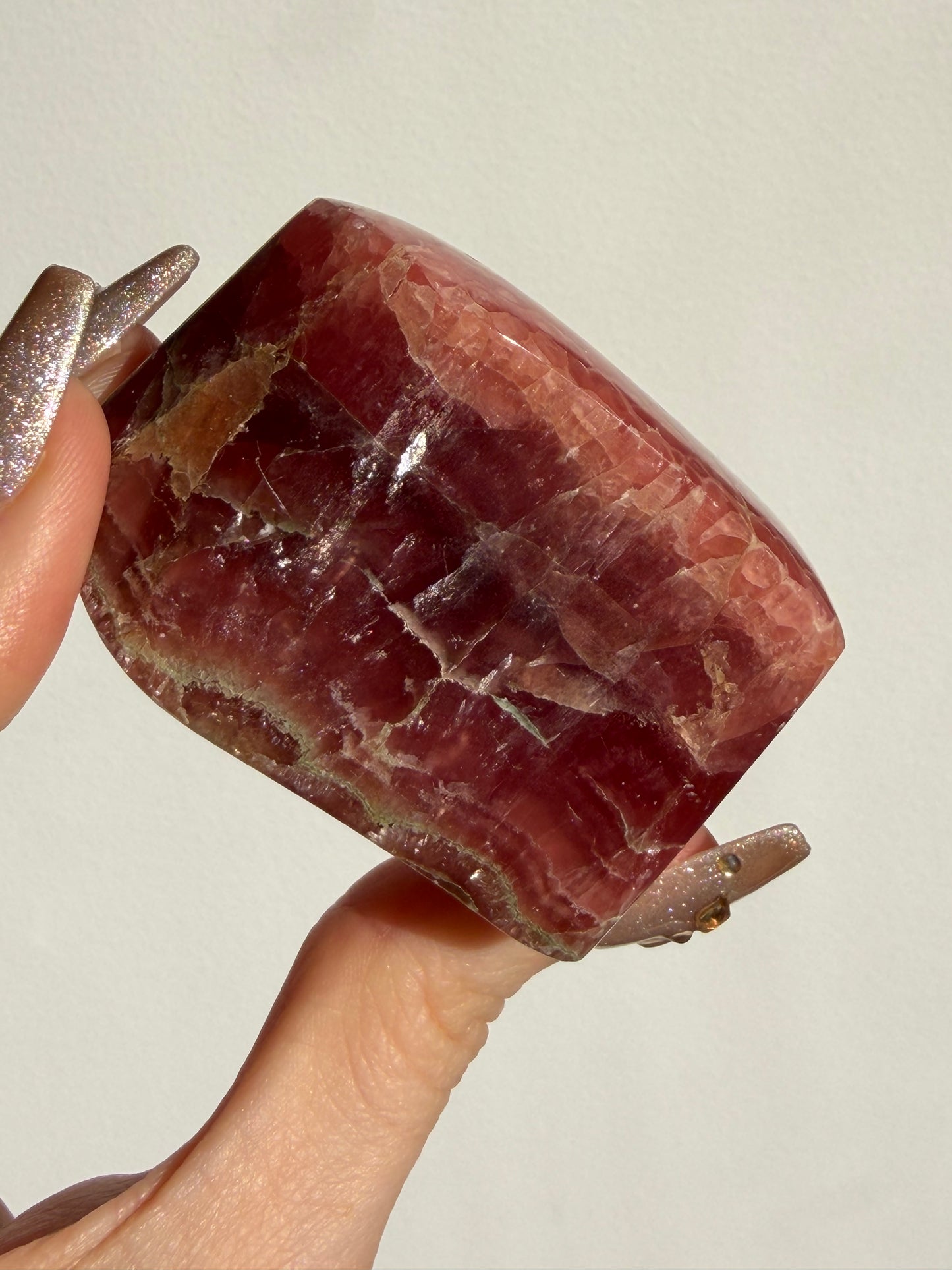 “Luminance” Gemmy Gel Rhodochrosite Freeform with Copper Inclusions