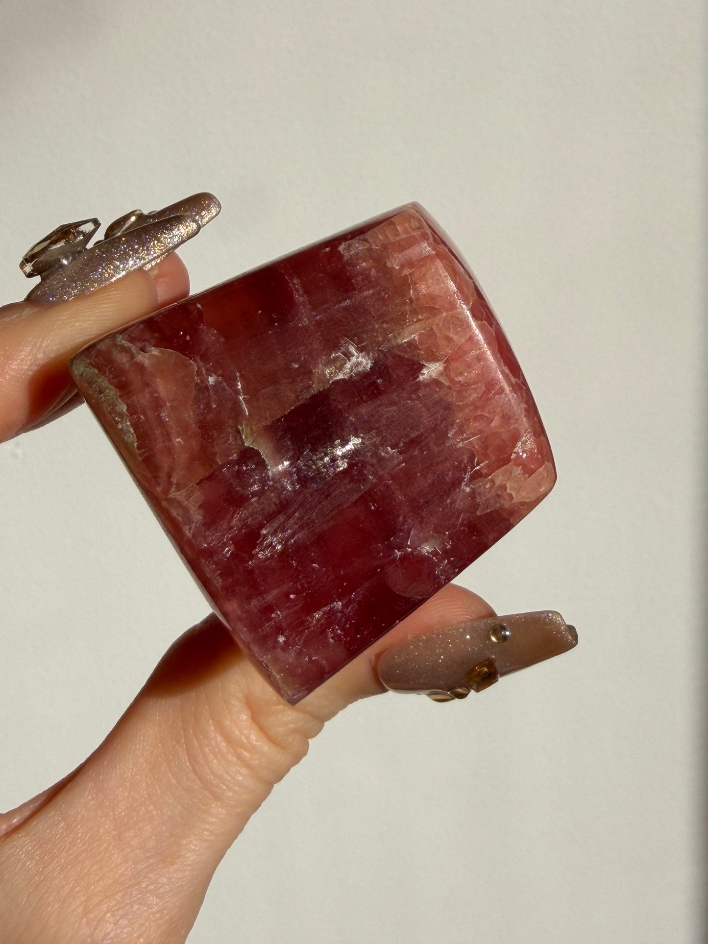“Luminance” Gemmy Gel Rhodochrosite Freeform with Copper Inclusions