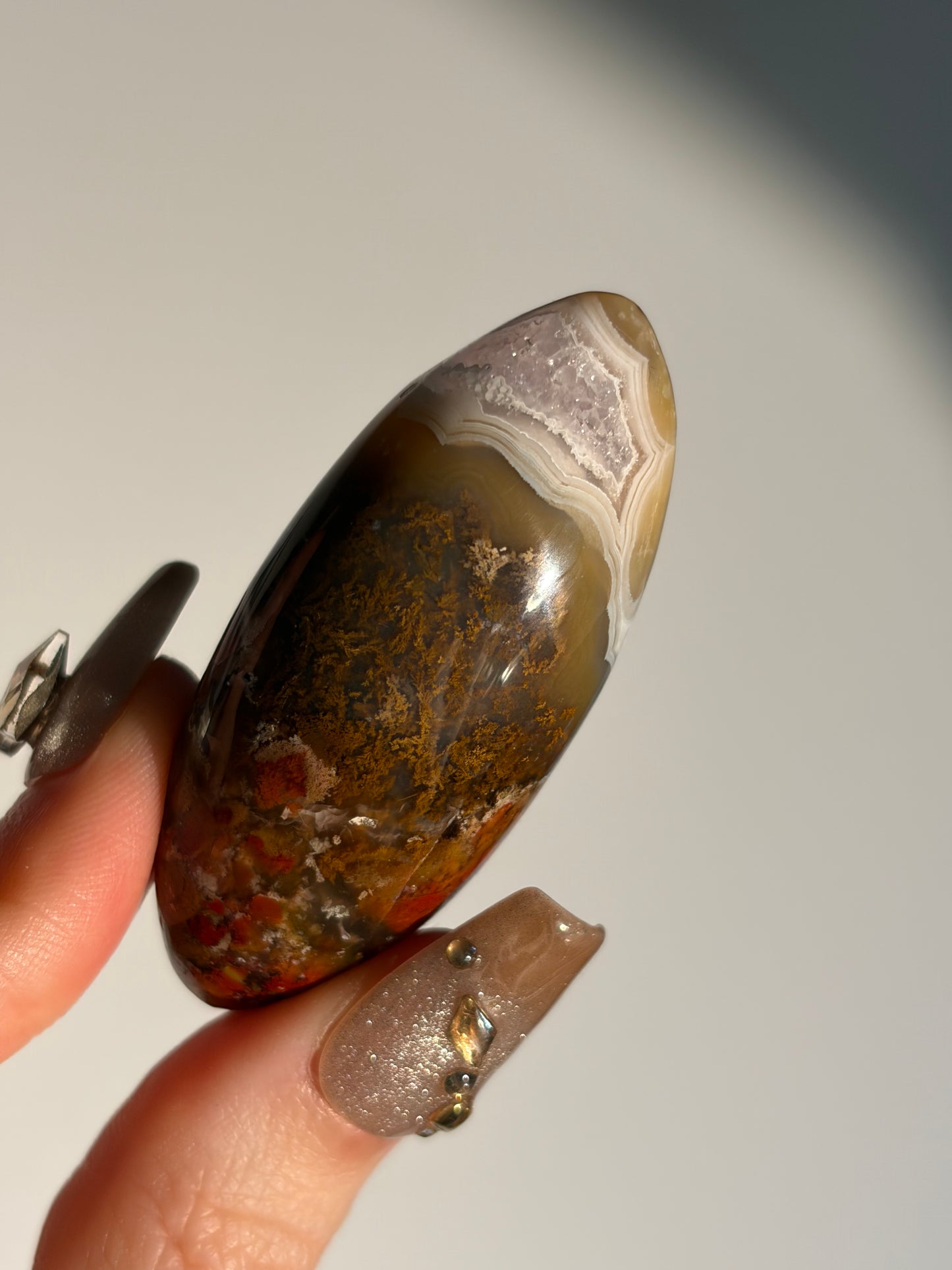 Nebula Agate with Amethyst and Red Moss Inclusions Shiva J (Parallax Effect)