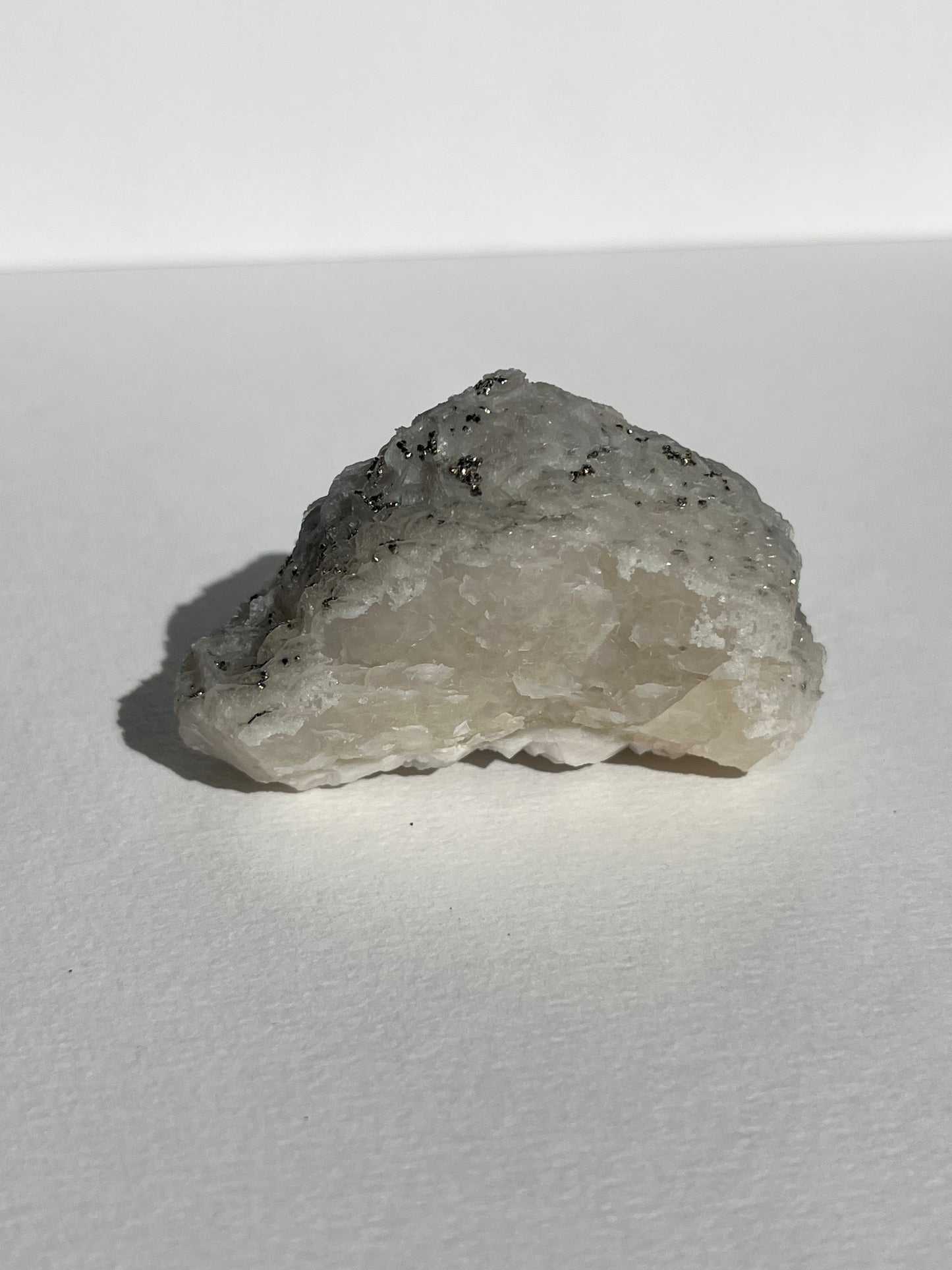Pyrite Dusted Pink Coin Calcite Specimen (UV Reactive)