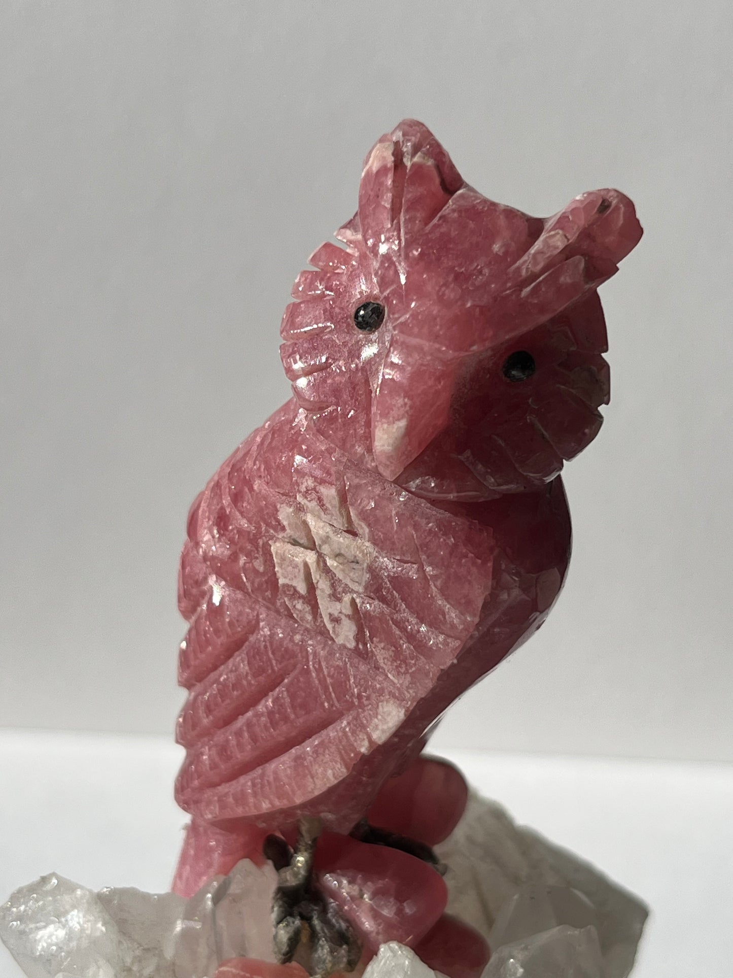 “Uatu” Gemmy Rhodochrosite Owl Carving on Quartz Cluster