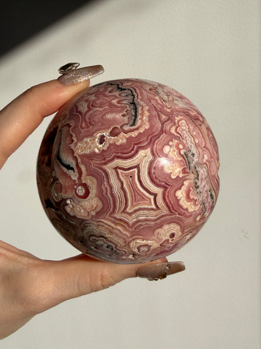“Rosen Blooms” Floral Banded Rhodochrosite Sphere A