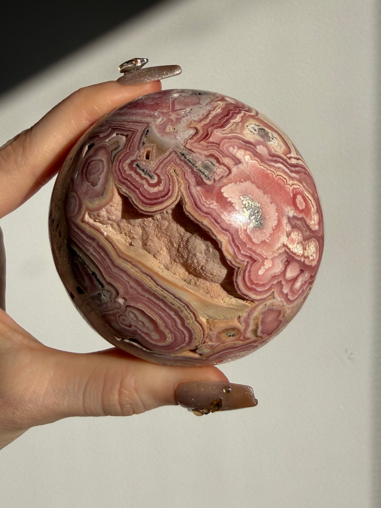 “Rosen Blooms” Floral Banded Rhodochrosite Sphere A