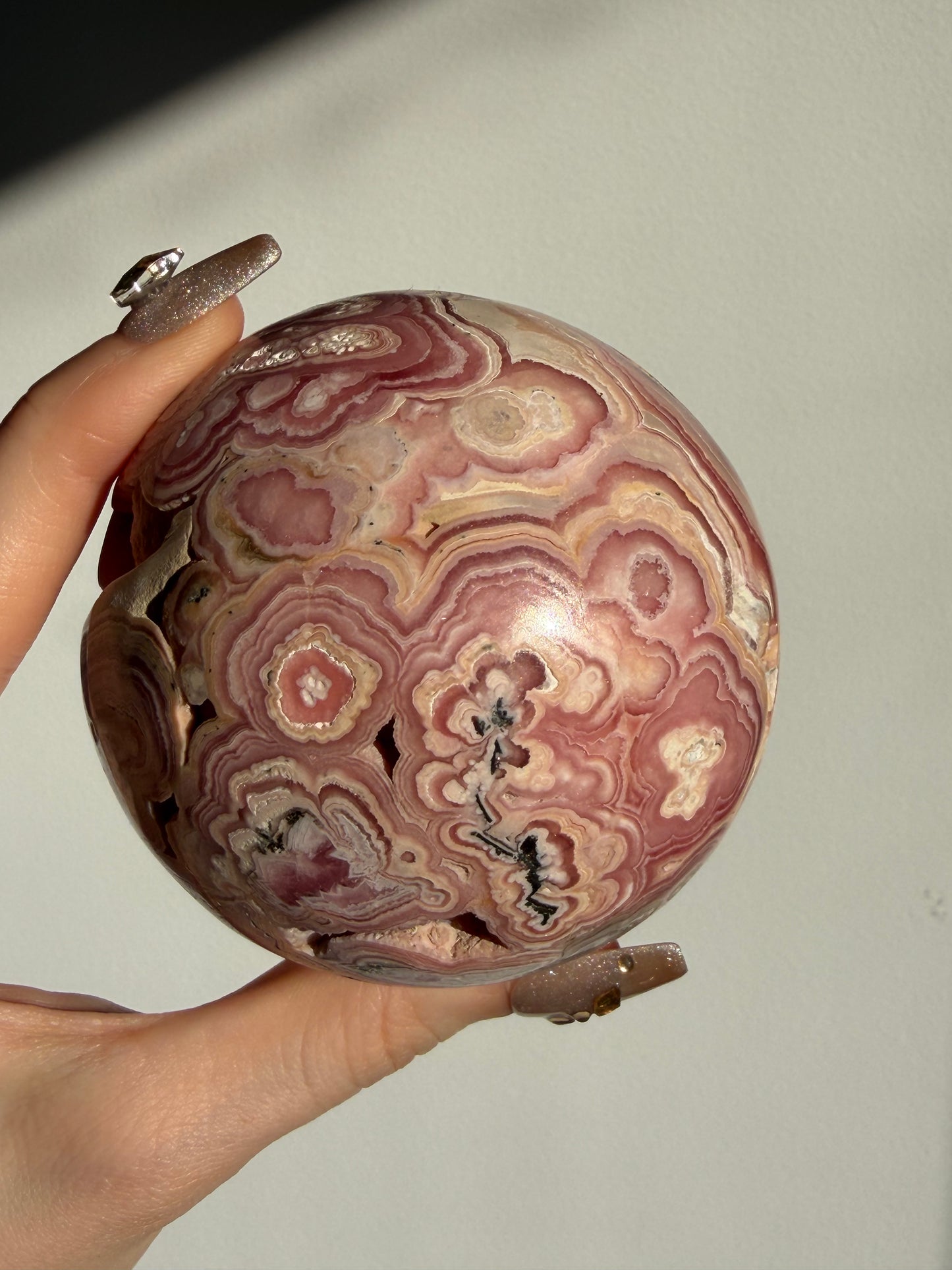 “Rosen Blooms” Floral Banded Rhodochrosite Sphere A