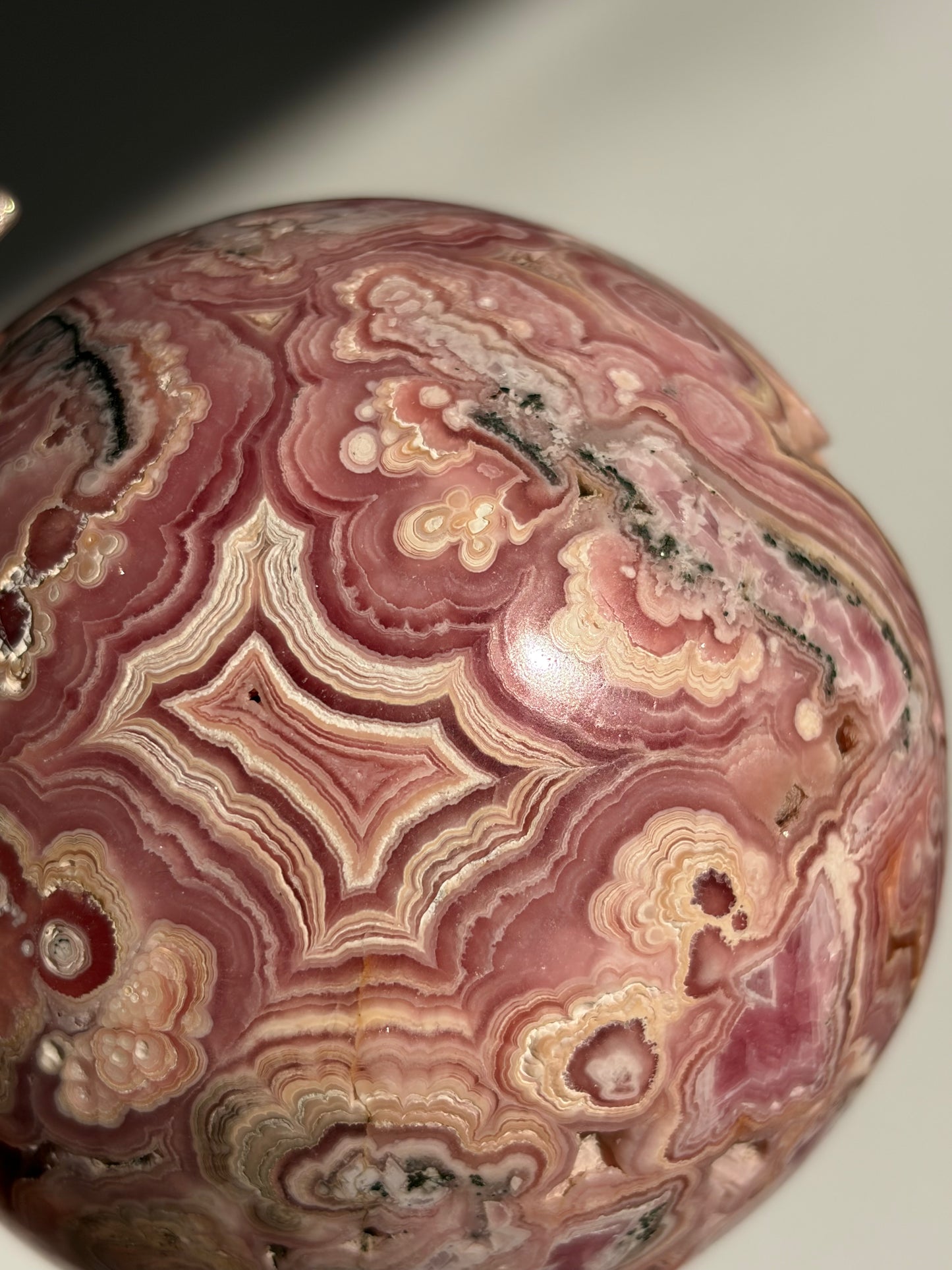 “Rosen Blooms” Floral Banded Rhodochrosite Sphere A