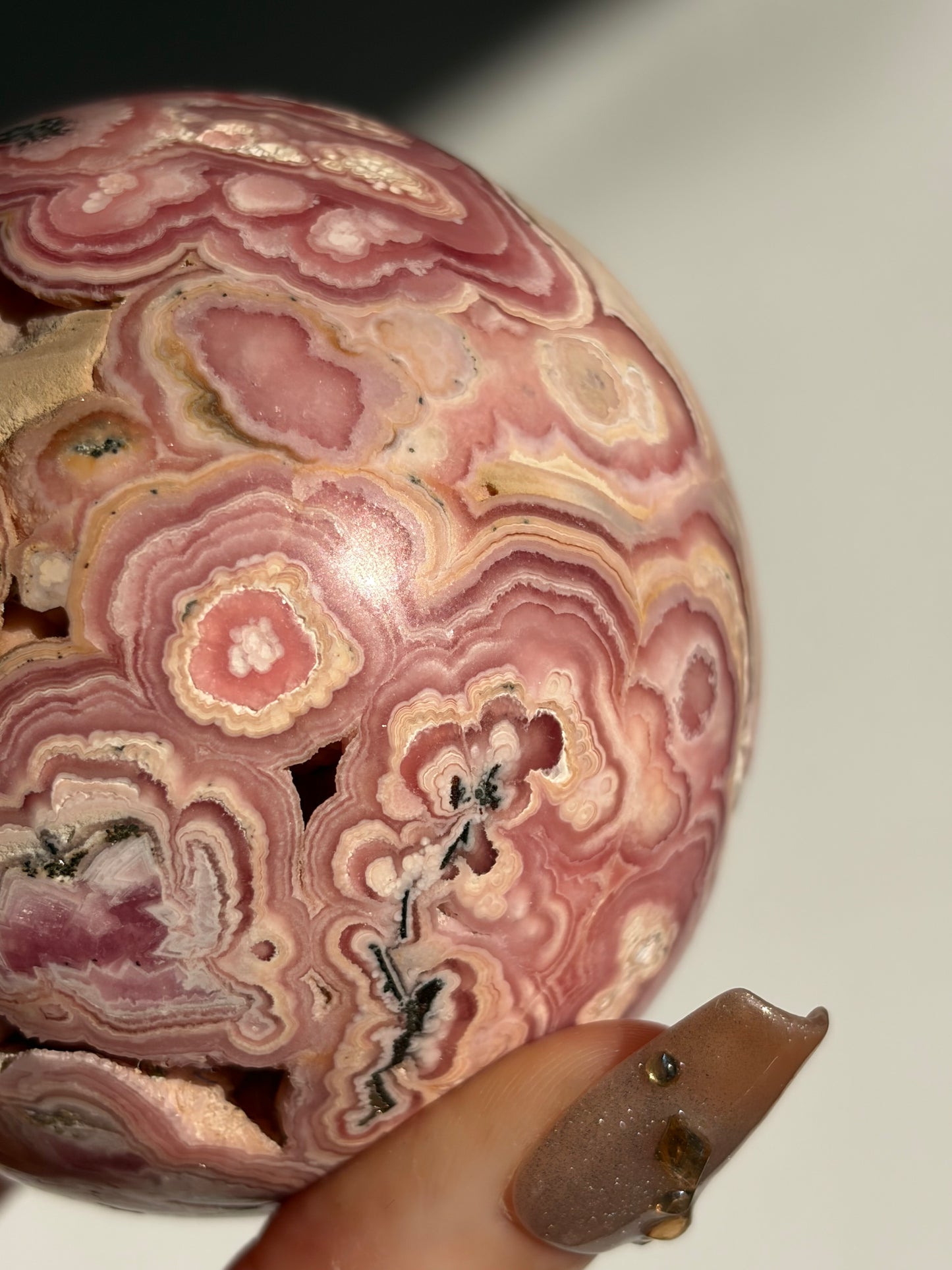 “Rosen Blooms” Floral Banded Rhodochrosite Sphere A