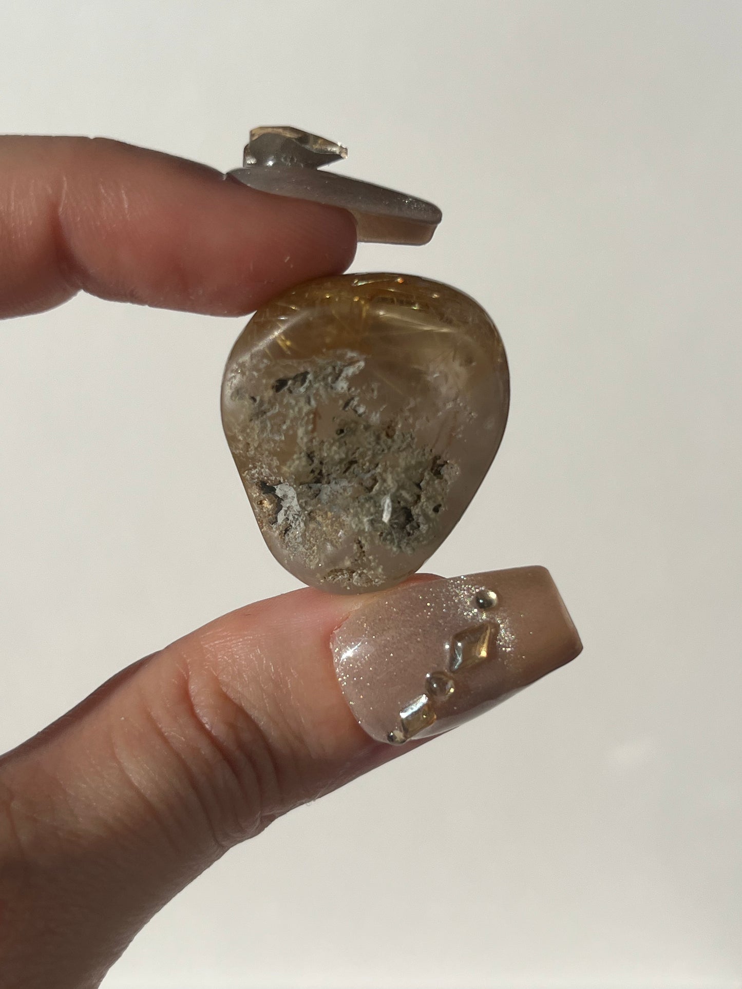 Rutilated Quartz Lens Carving A