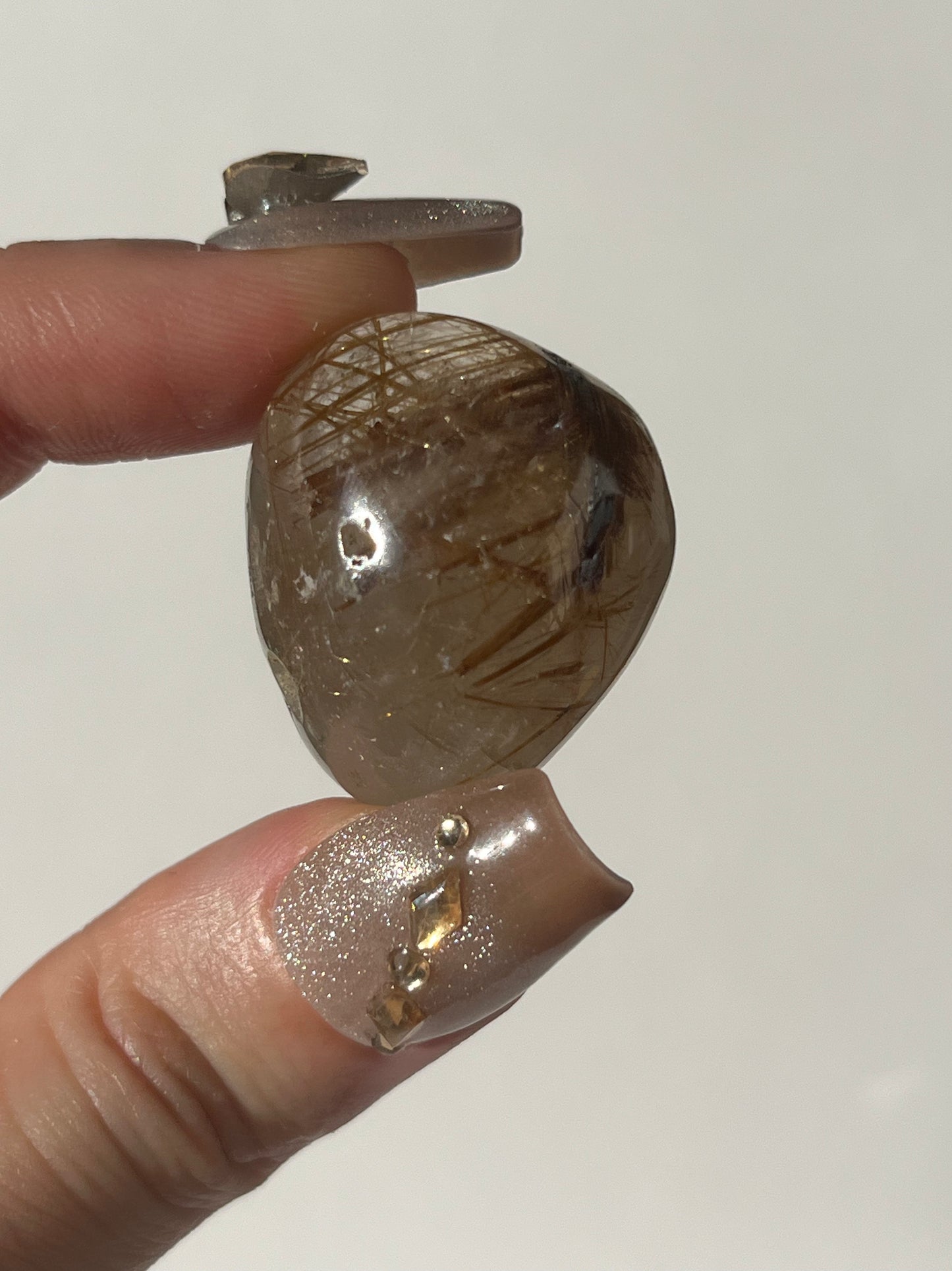 Rutilated Quartz Lens Carving A